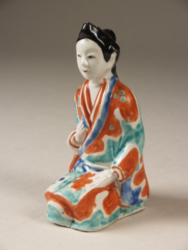 Vrouw, geknield zittende geisha, Arita